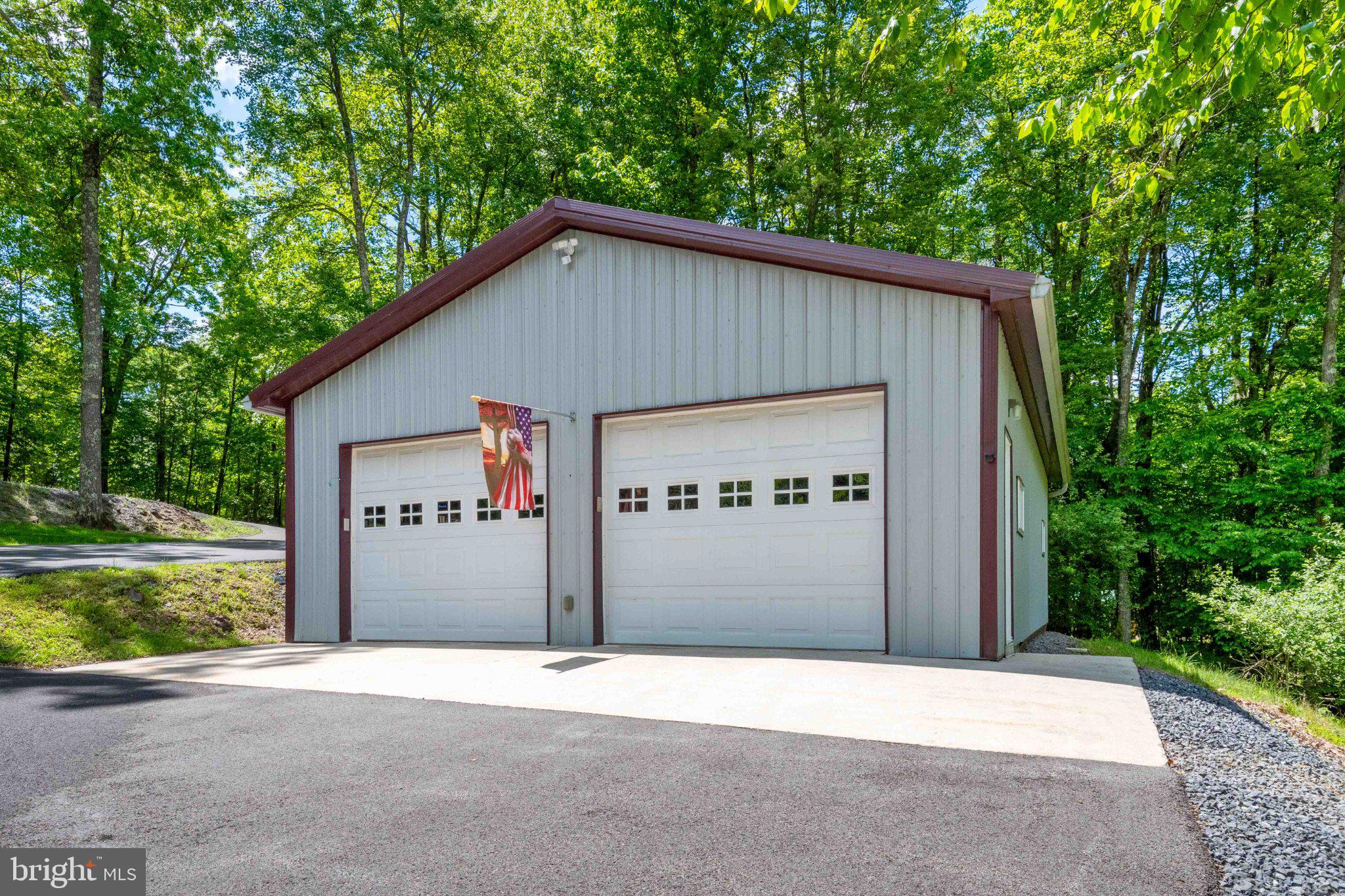 511 Hill Top Road Oakland, MD 21550 - Photo 7 of 51 Charming garage nestled in nature.