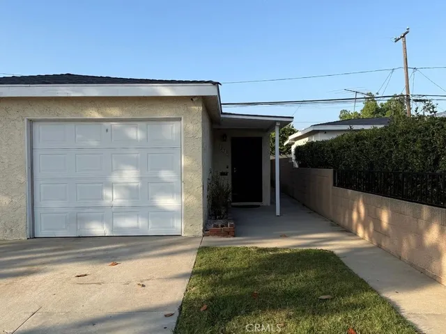 a view of a back yard of the house