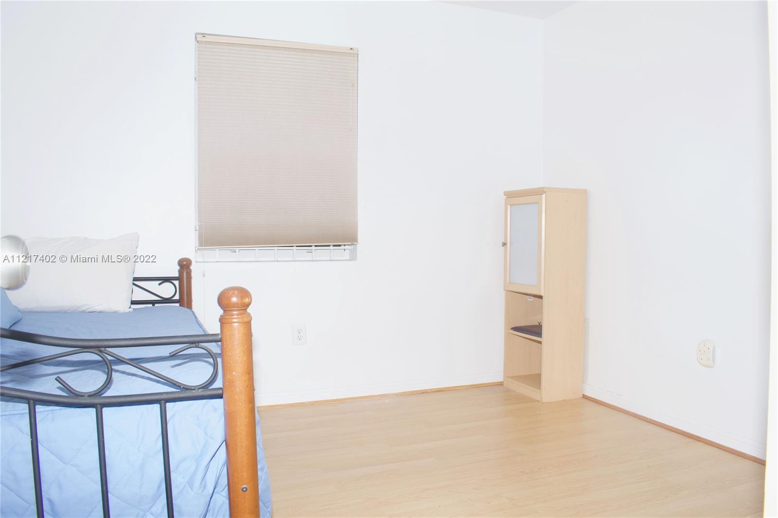 Westview Miami, FL 33167 - Photo 12 of 18 a view of a room with table and a chair