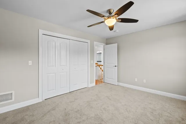 a spacious bathroom with a bathtub and a sink