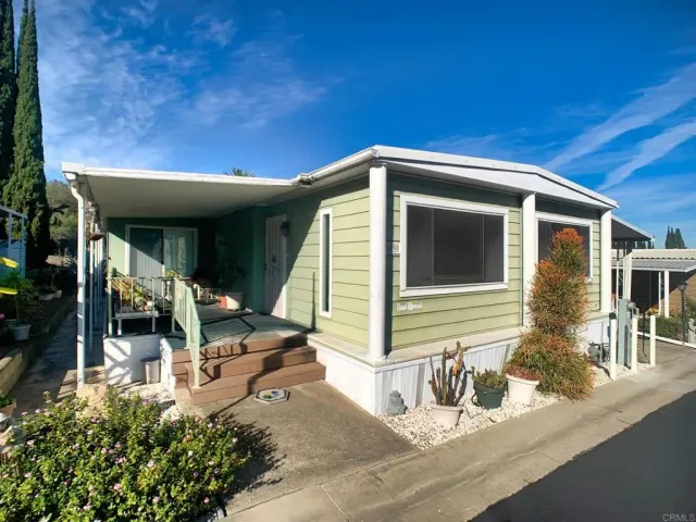 a front view of a house with patio