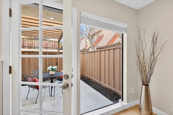 a view of dining room and wooden floor
