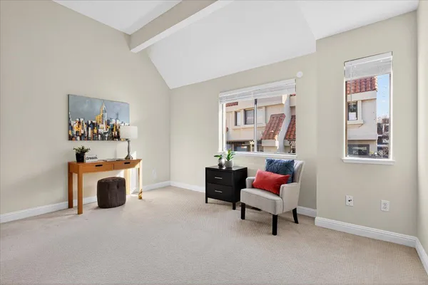 a living room with furniture and a couch