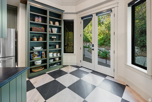 1141 South Oak Leaf Lane Springville, UT 84663 - Photo 48 of 147 Checkerboard wood-finish flooring with dual pane French doors to the exterior
