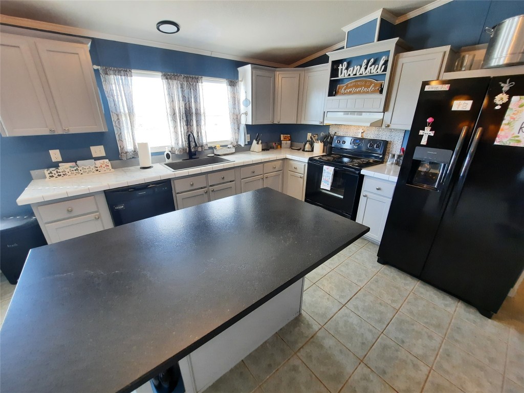 3160 Pettytown Road Dale, TX 78616 - Photo 24 of 37 a view of a kitchen with stainless steel appliances