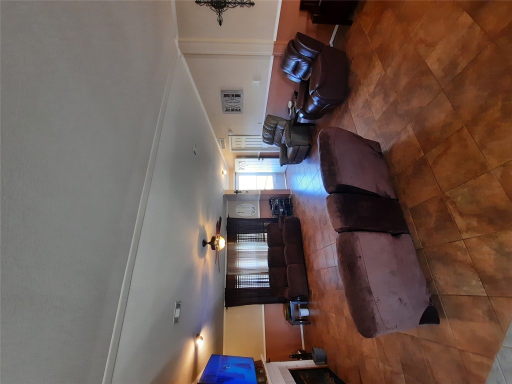 3160 Pettytown Road Dale, TX 78616 - Photo 26 of 37 a living room with furniture and a flat screen tv