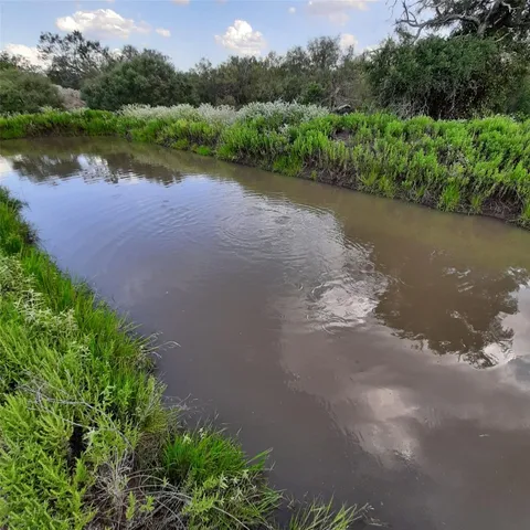 a view of a lake with outdoor space
