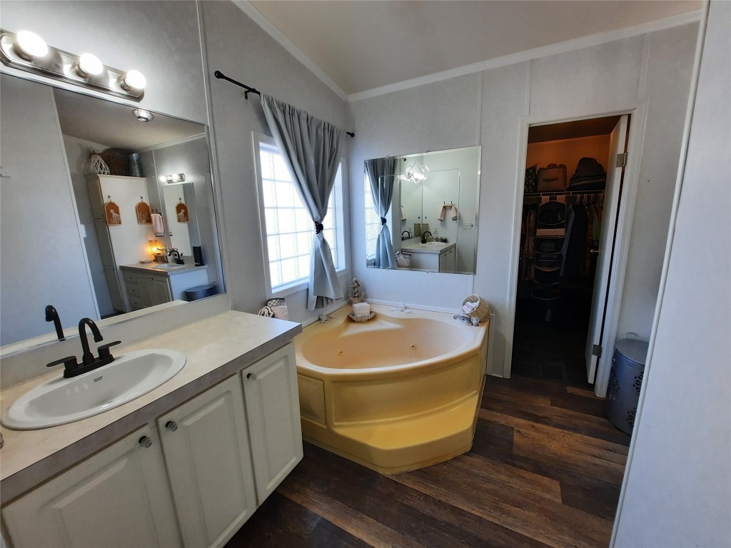 3160 Pettytown Road Dale, TX 78616 - Photo 36 of 37 a bathroom with a sink and a mirror