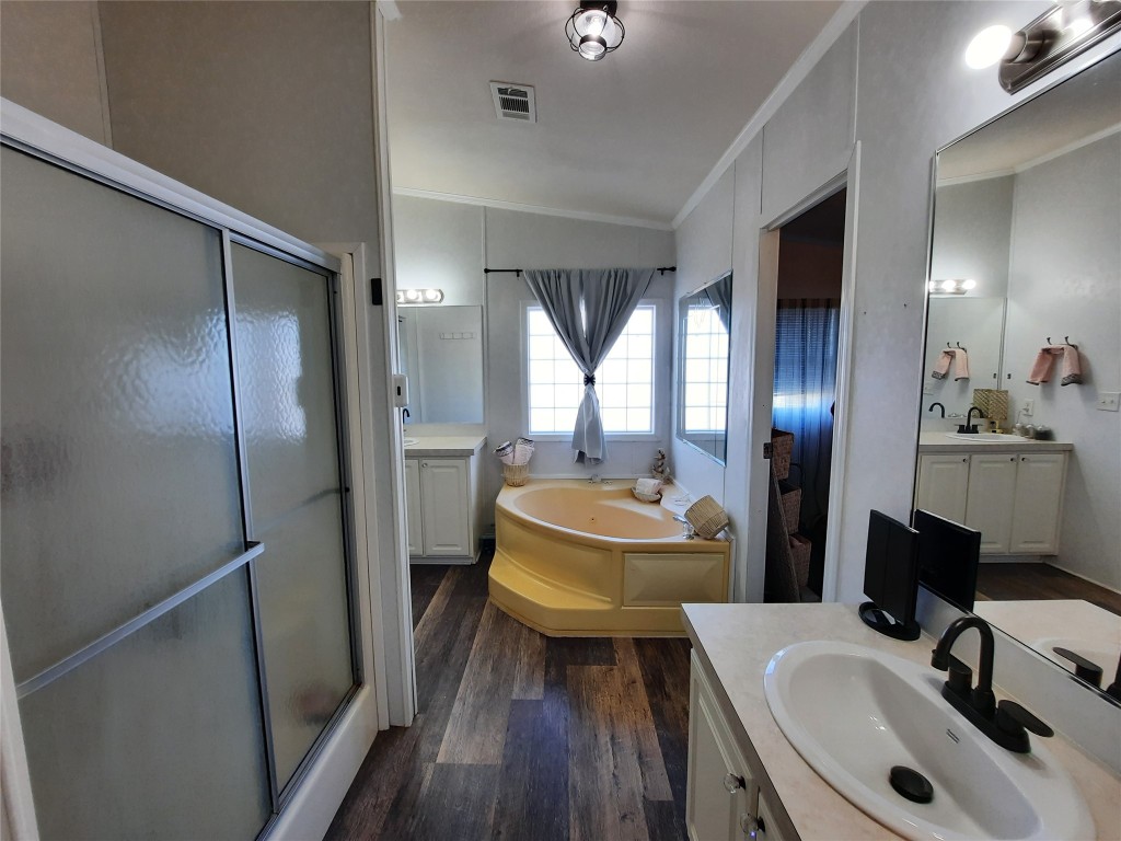 3160 Pettytown Road Dale, TX 78616 - Photo 37 of 37 a bathroom with a sink a toilet and a mirror