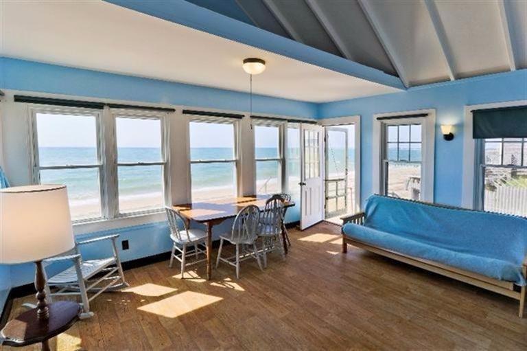 276 Shore Road, Unit 3 Truro, MA 02666 - Photo 6 of 12 a living room with furniture and a large window