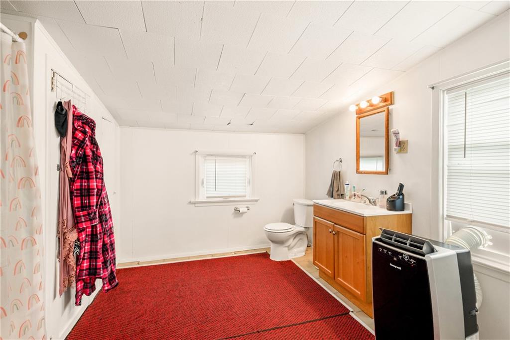 2030 Indian Head Road Indian Head, PA 15446 - Photo 14 of 26 a room with furniture a rug and a window