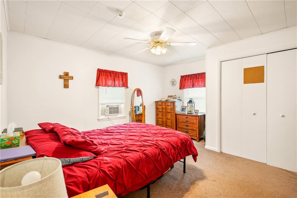 2030 Indian Head Road Indian Head, PA 15446 - Photo 16 of 26 a bed room with a bed and a couch