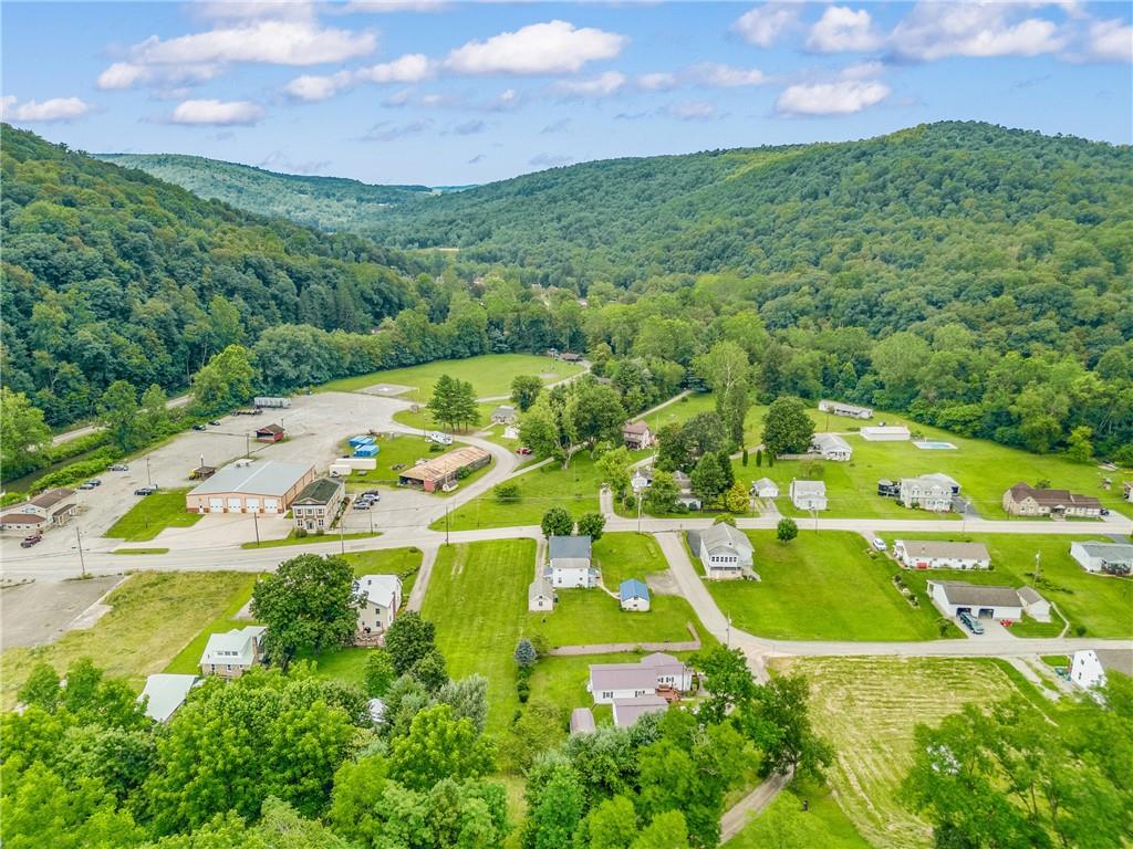 2030 Indian Head Road Indian Head, PA 15446 - Photo 25 of 26 an aerial view of residential houses with outdoor space and a street view