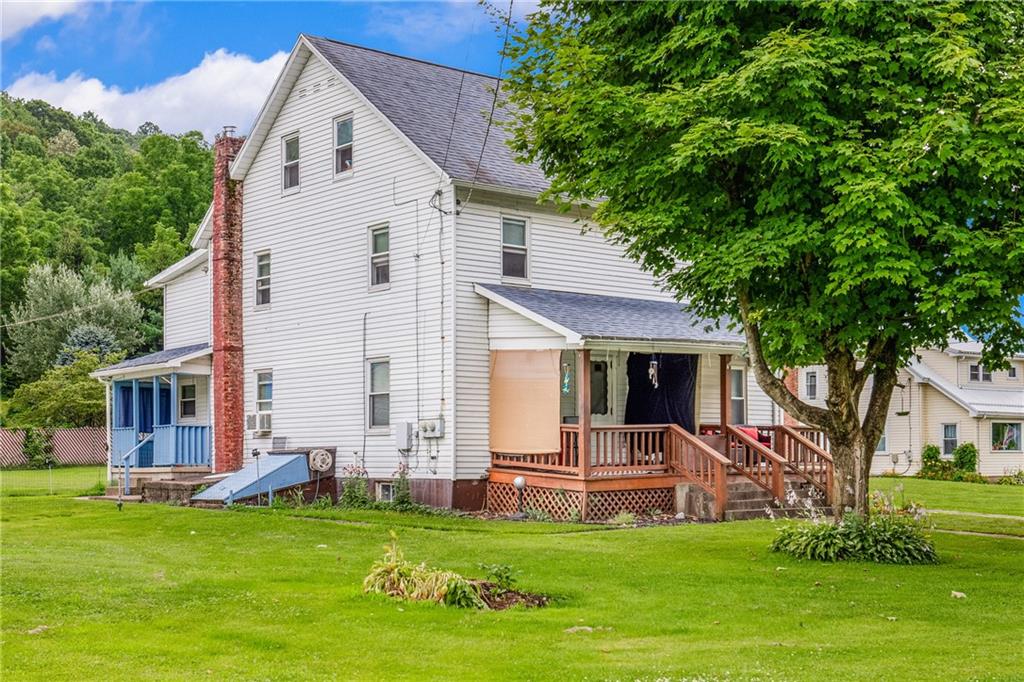 2030 Indian Head Road Indian Head, PA 15446 - Photo 3 of 26 a view of a house with a backyard