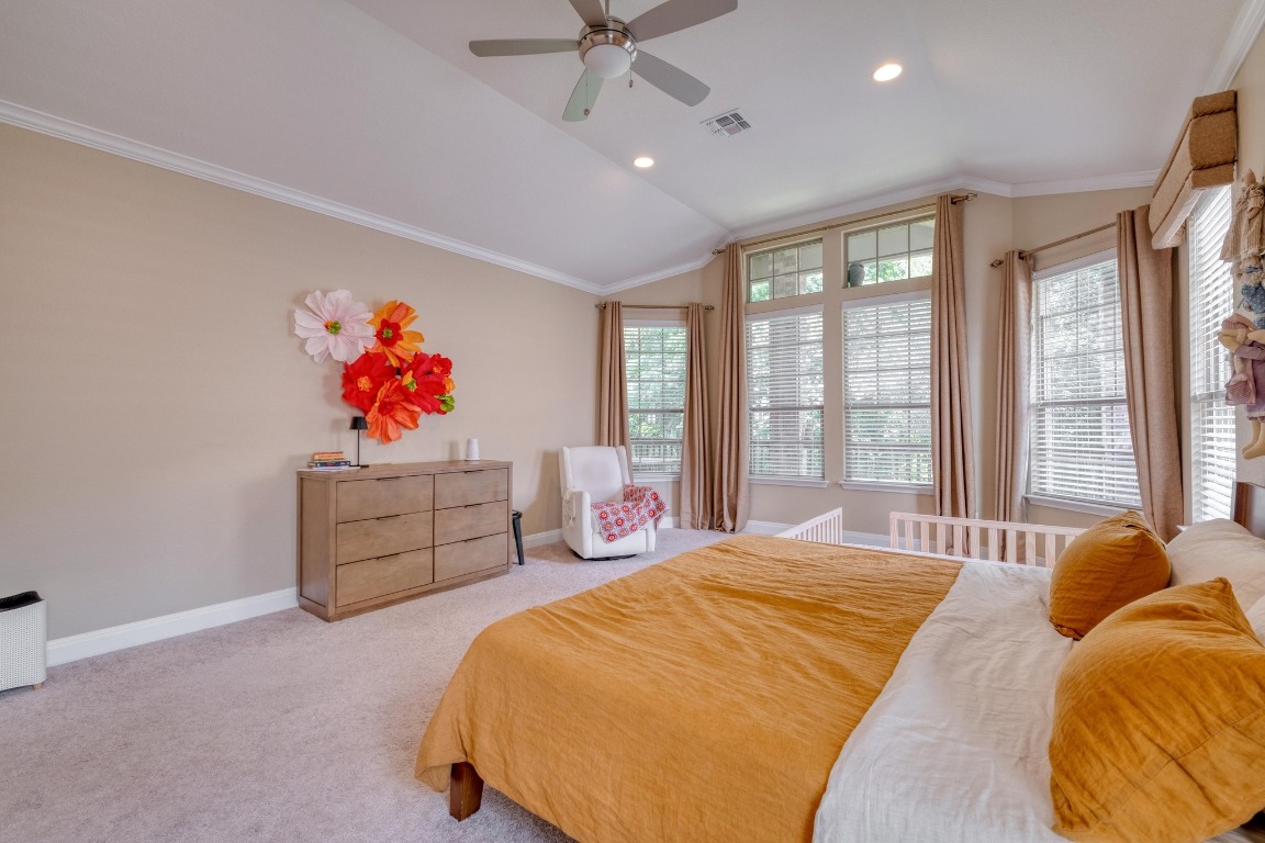 636 Trailside Bend Round Rock, TX 78665 - Photo 18 of 35 a bedroom with a bed and a large window