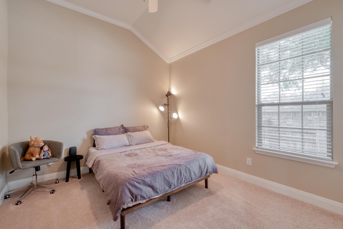 636 Trailside Bend Round Rock, TX 78665 - Photo 24 of 35 a bedroom with a bed and window