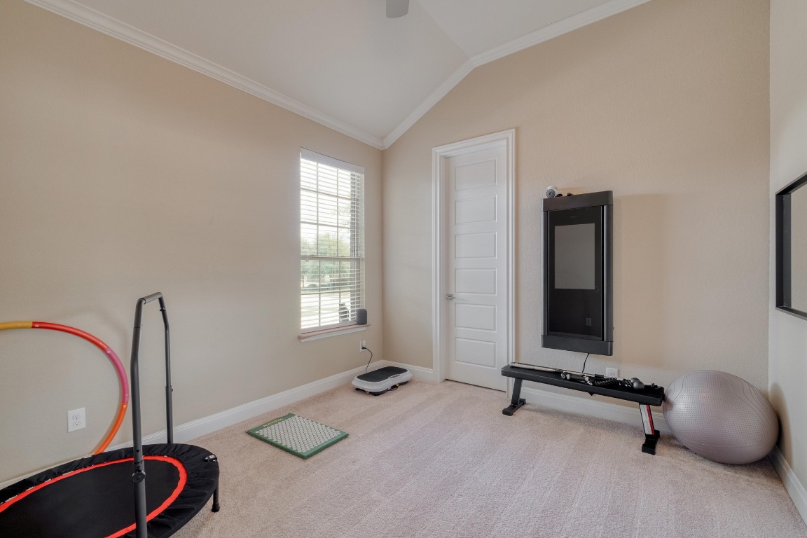 636 Trailside Bend Round Rock, TX 78665 - Photo 25 of 35 a room with gym equipment and a window