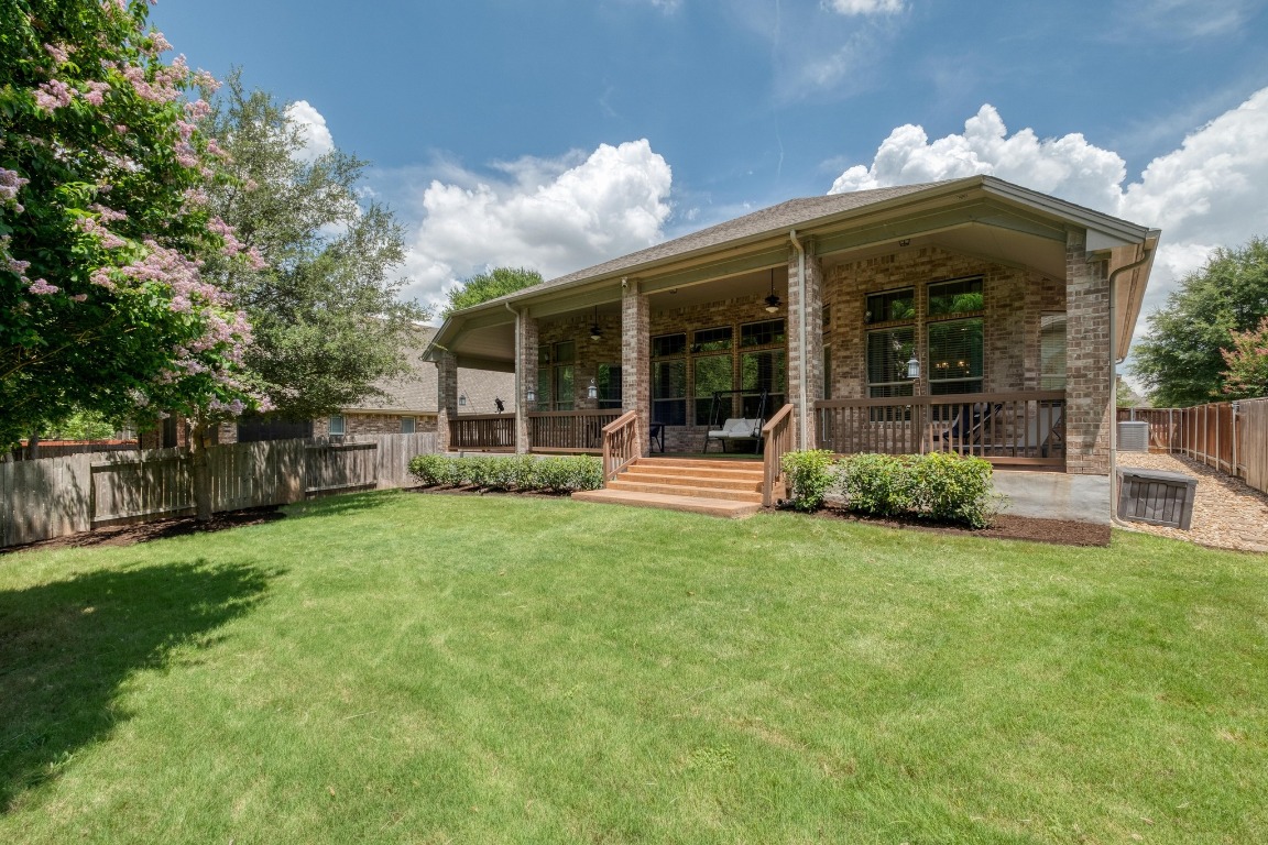 636 Trailside Bend Round Rock, TX 78665 - Photo 32 of 35 a view of a house with backyard and porch