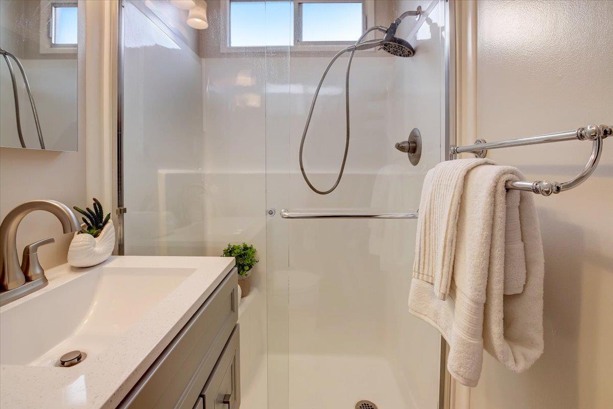 1209 Ridgewood Drive Millbrae, CA 94030 - Photo 26 of 59 a bathroom with a sink and mirror