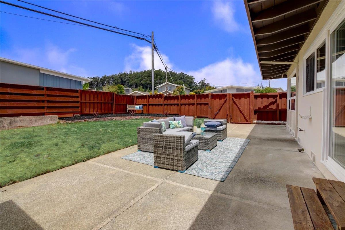 1209 Ridgewood Drive Millbrae, CA 94030 - Photo 29 of 59 a view of a patio with a table and chairs
