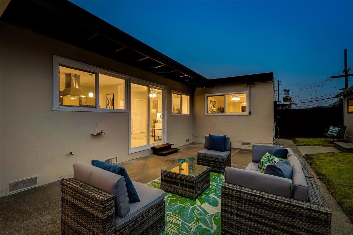 1209 Ridgewood Drive Millbrae, CA 94030 - Photo 39 of 59 a living room with furniture and a flat screen tv