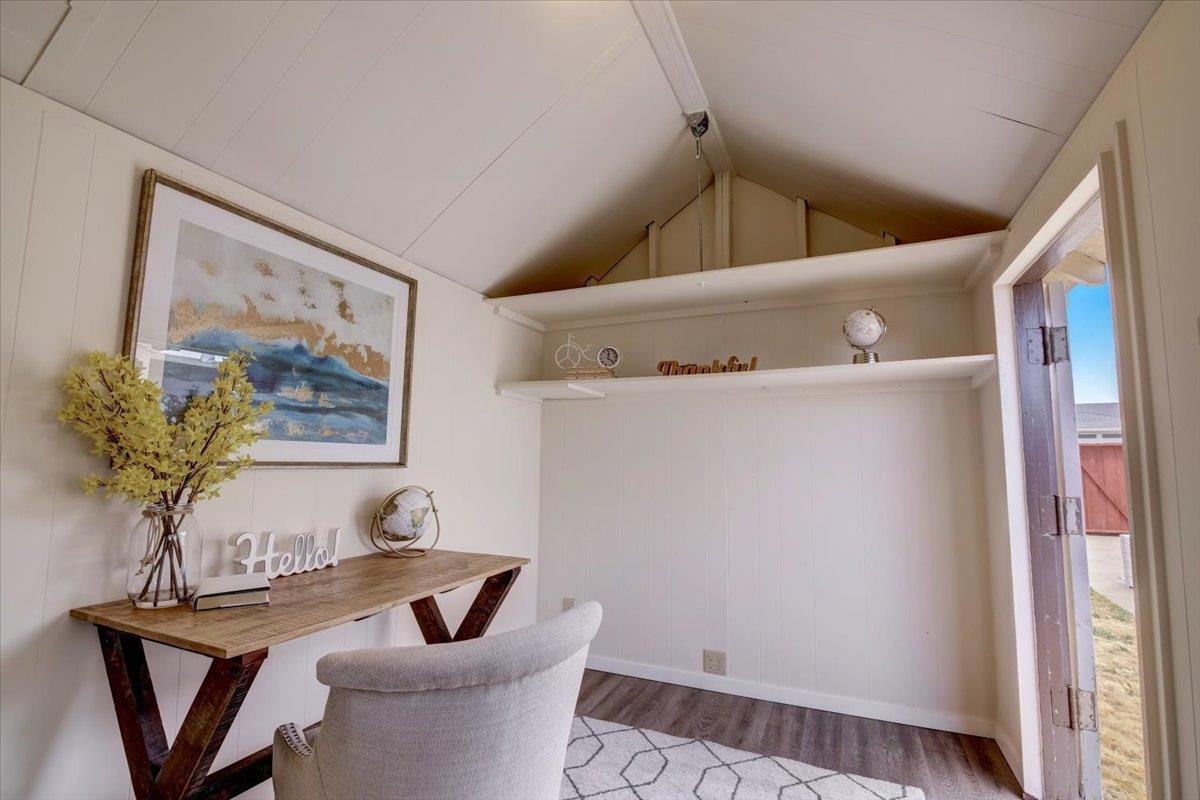 1209 Ridgewood Drive Millbrae, CA 94030 - Photo 46 of 59 a view of a hallway with furniture and wooden floor