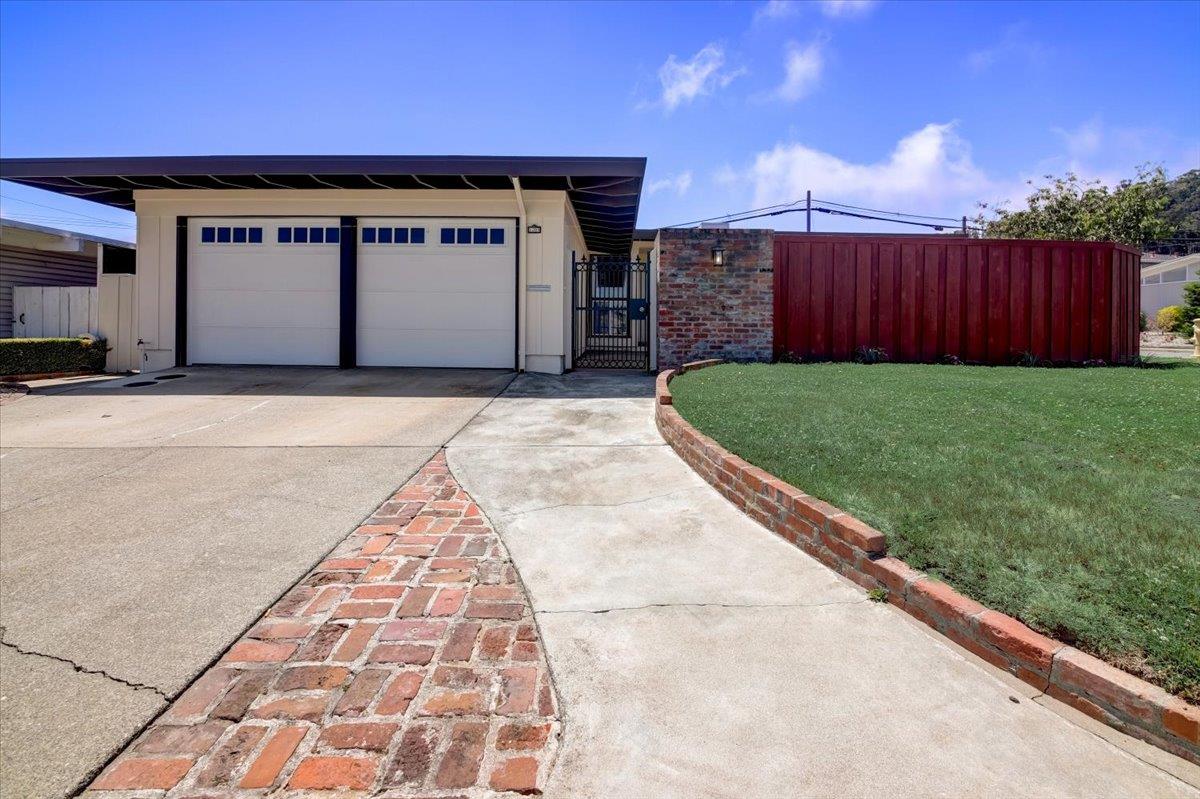 1209 Ridgewood Drive Millbrae, CA 94030 - Photo 58 of 59 a view of a parking space with a barbeque