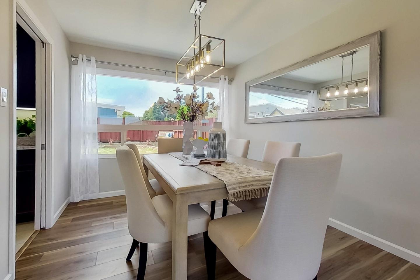 1209 Ridgewood Drive Millbrae, CA 94030 - Photo 8 of 59 a view of a dining room with furniture window and wooden floor