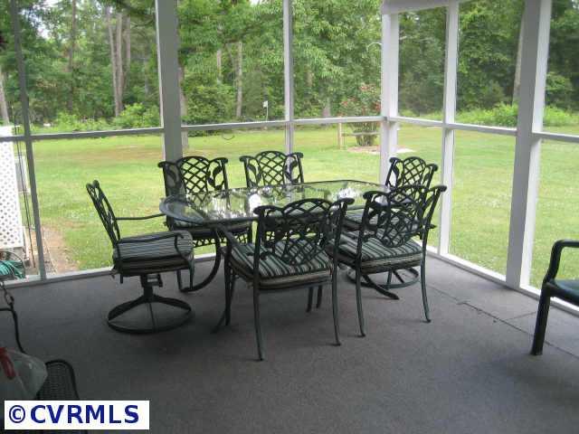 300 Monath Road Richmond, VA 23236 - Photo 9 of 10 a view of a chairs and table in patio