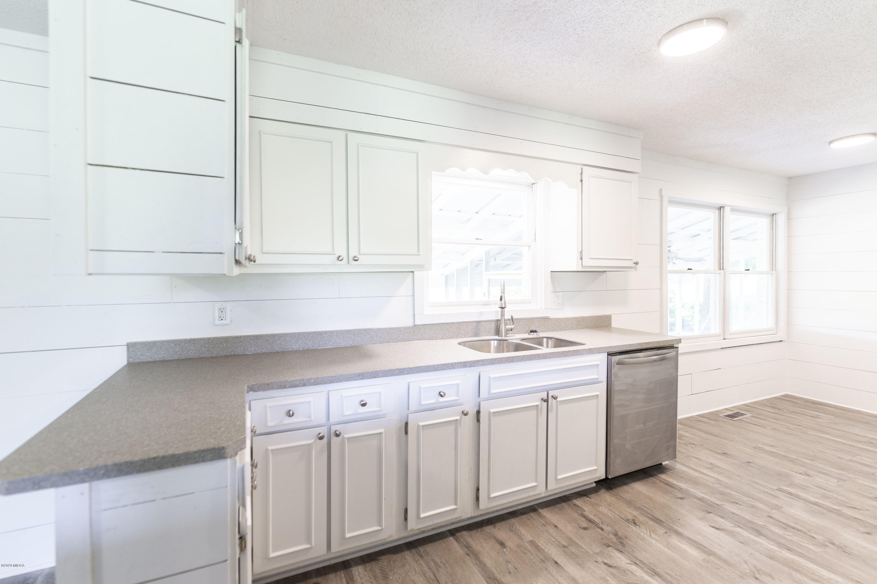 246 Allred Road Byron, GA 31008 - Photo 19 of 53 a kitchen with sink cabinets and window