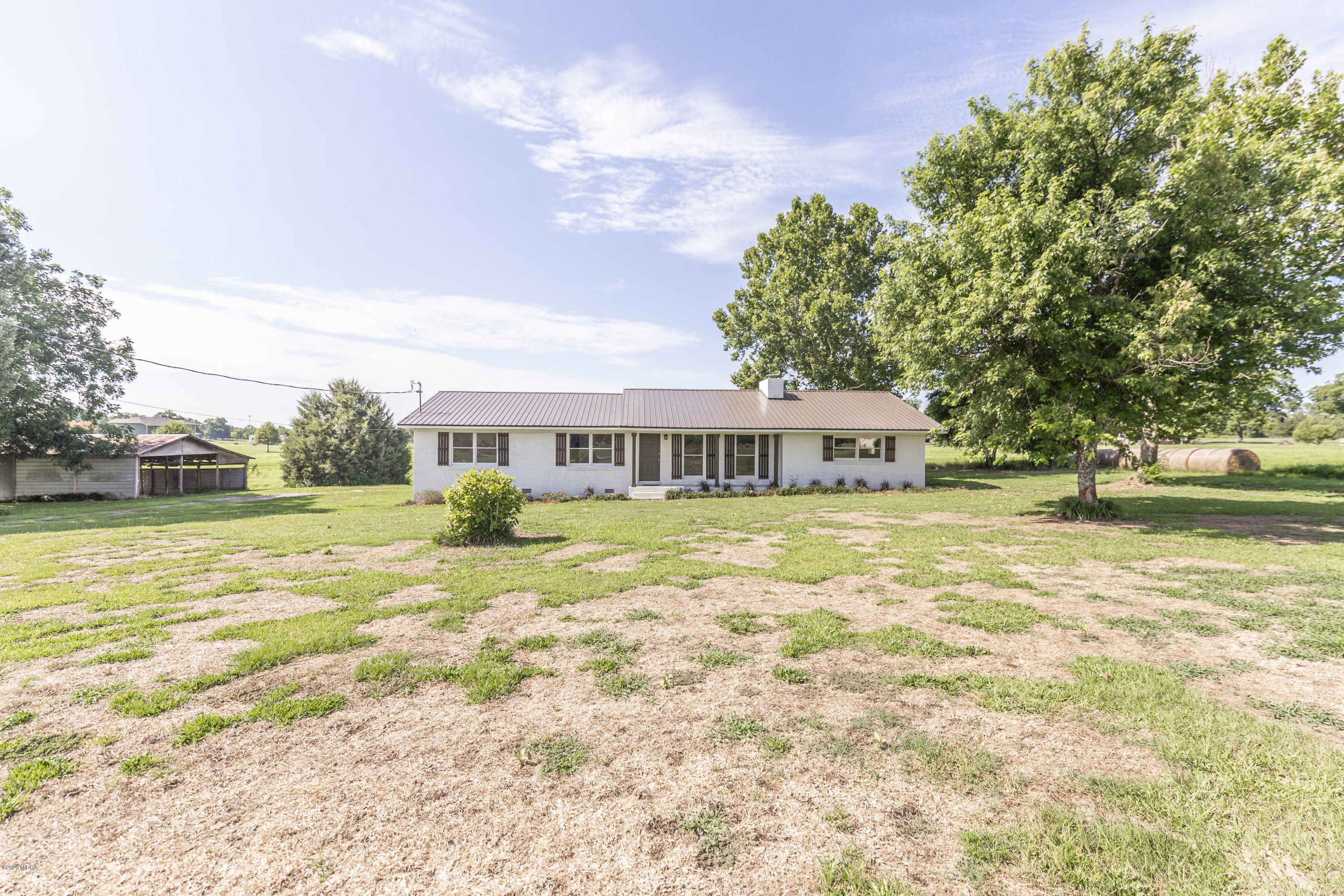 246 Allred Road Byron, GA 31008 - Photo 4 of 53 a front view of a house with a yard