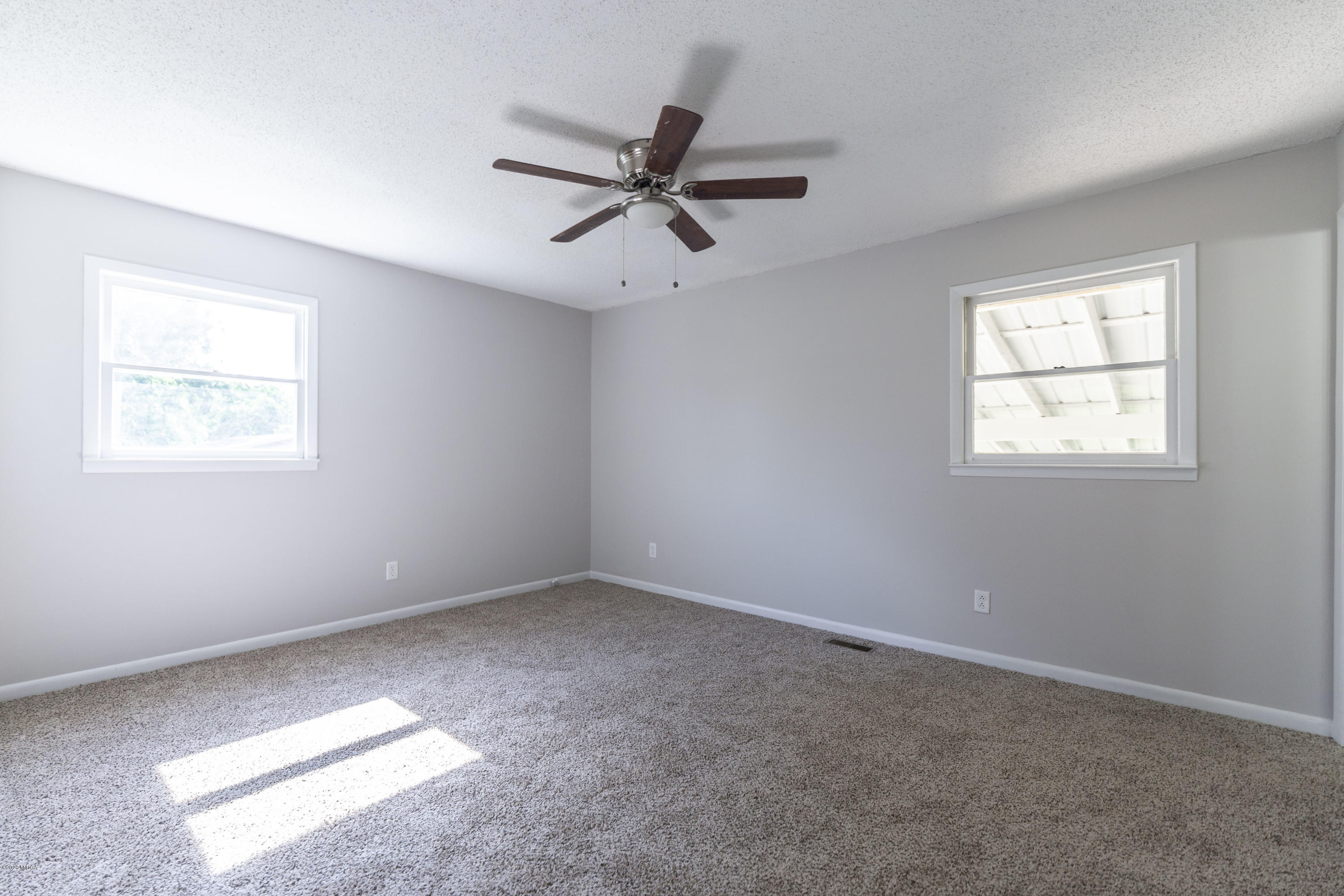 246 Allred Road Byron, GA 31008 - Photo 33 of 53 a view of an empty room with a window