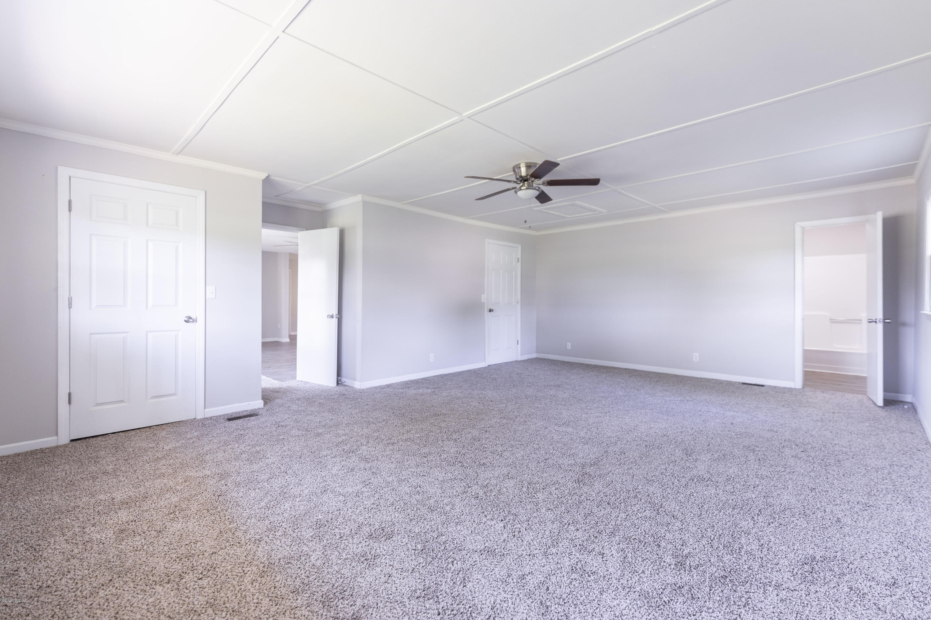 246 Allred Road Byron, GA 31008 - Photo 37 of 53 a view of an empty room with a window