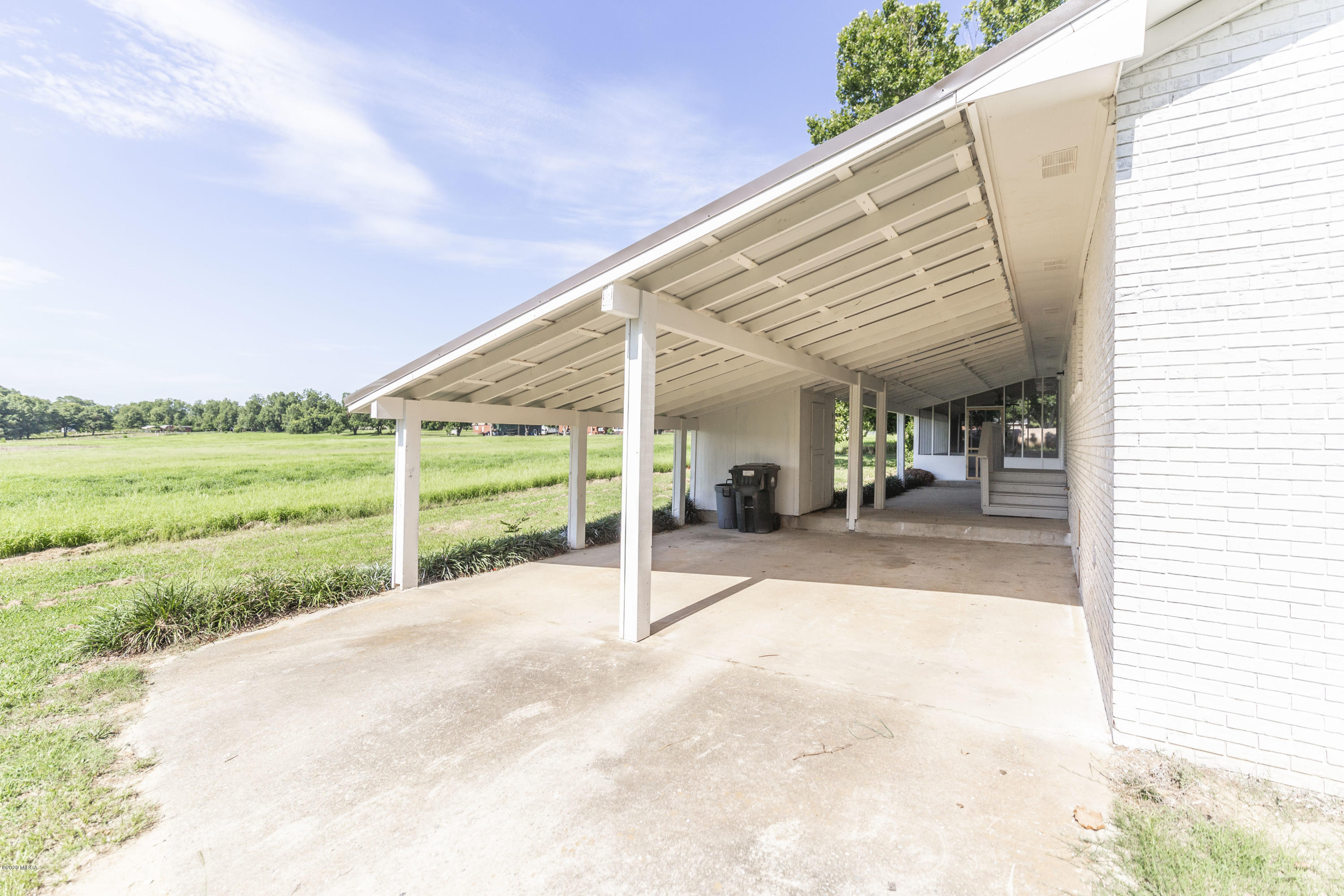 246 Allred Road Byron, GA 31008 - Photo 44 of 53 a view of a house with backyard and porch