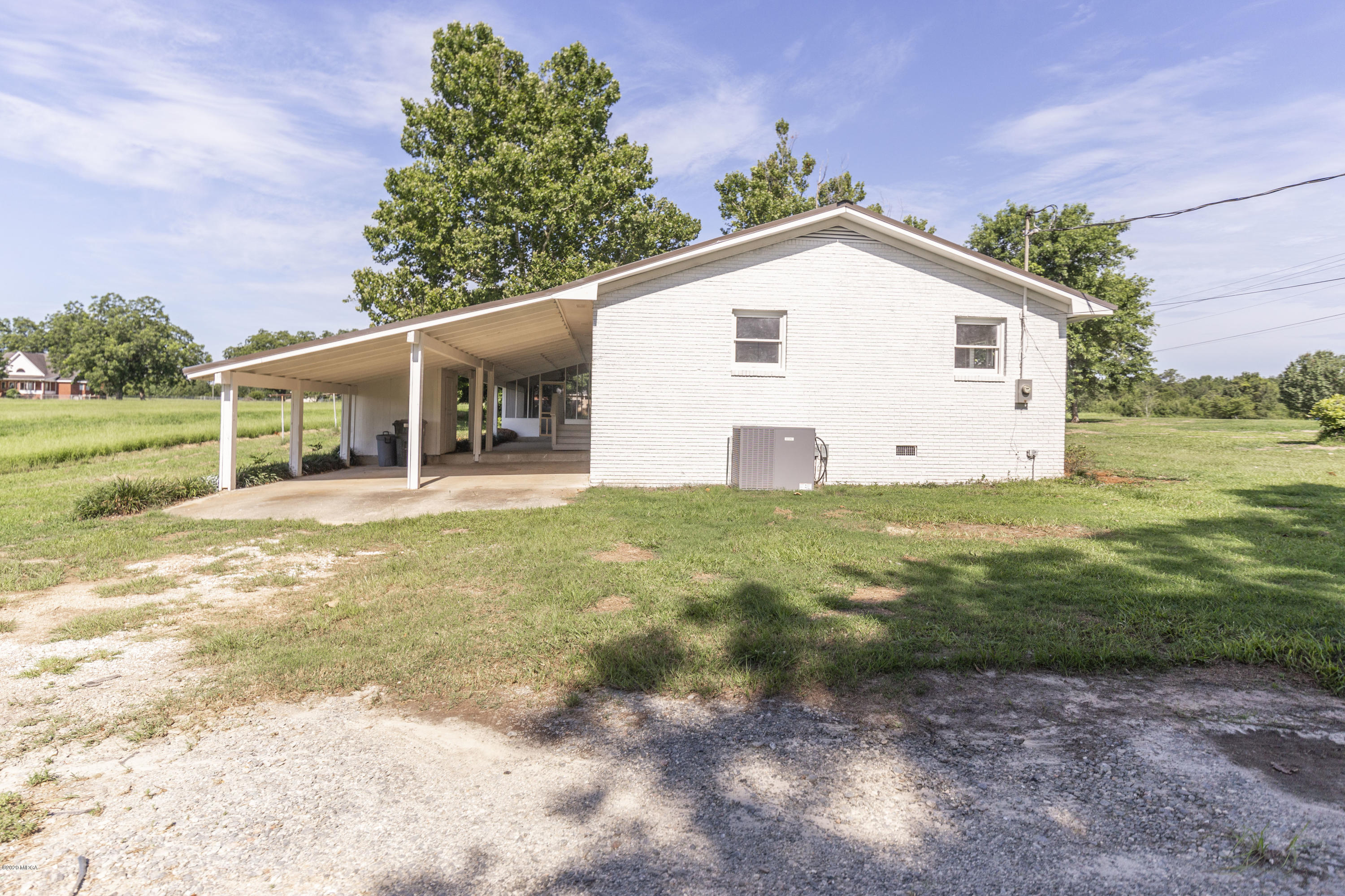246 Allred Road Byron, GA 31008 - Photo 45 of 53 a view of a house with backyard and trees