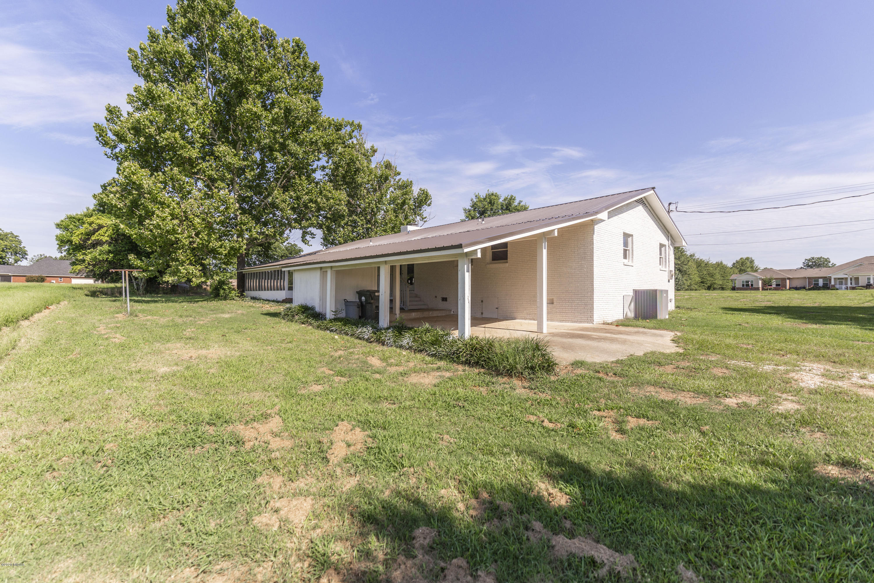 246 Allred Road Byron, GA 31008 - Photo 46 of 53 a view of a house with a yard and a garage