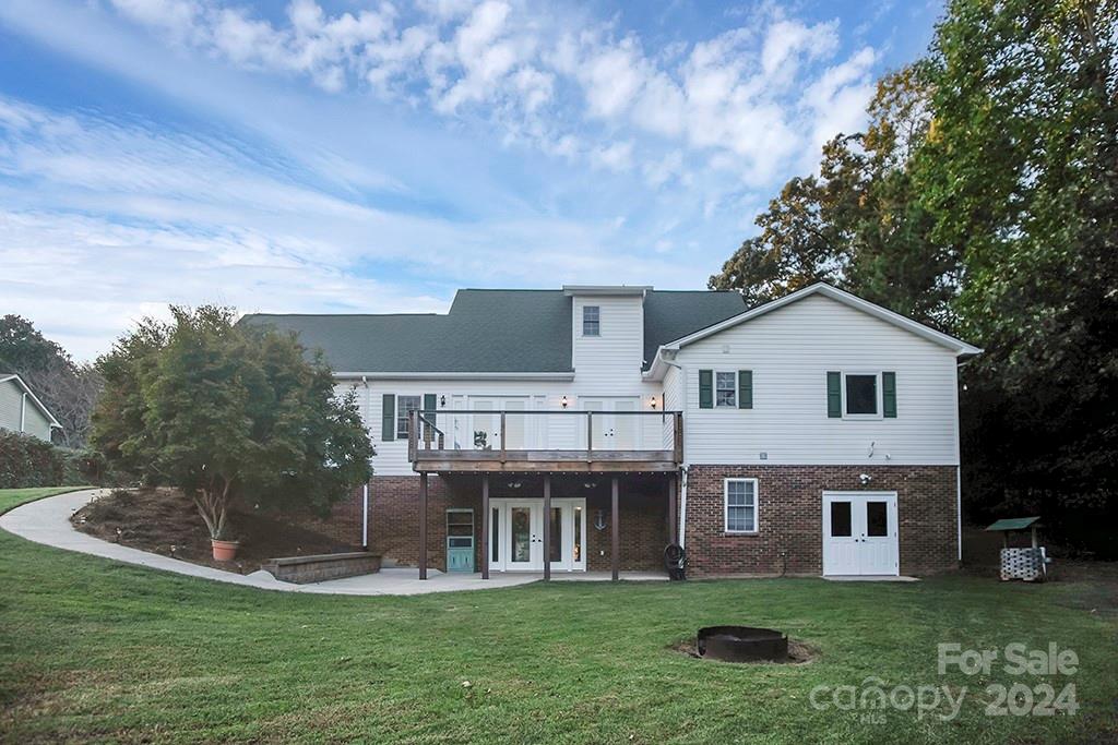 210 Harbor Point Drive Cherryville, NC 28021 - Photo 29 of 45 a view of a house with a yard porch and sitting area