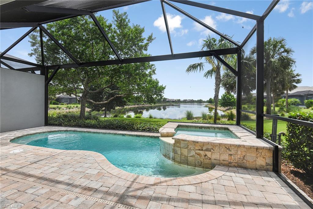 5764 Elbow Avenue Naples, FL 34113 - Photo 28 of 48 a view of swimming pool with a patio