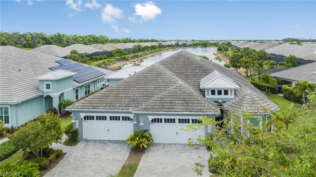5764 Elbow Avenue Naples, FL 34113 - Photo 46 of 48 an aerial view of a house with a garden
