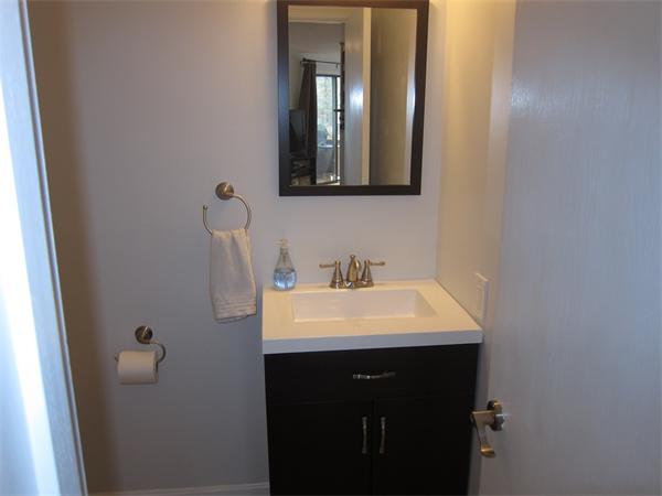 77 Mountain Gate Road, Unit 77 Ashland, MA 01721 - Photo 14 of 20 a bathroom with a sink and a mirror