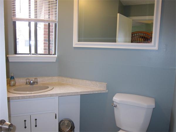 77 Mountain Gate Road, Unit 77 Ashland, MA 01721 - Photo 19 of 20 a bathroom with a sink and a toilet