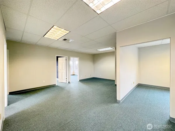 an empty room with windows
