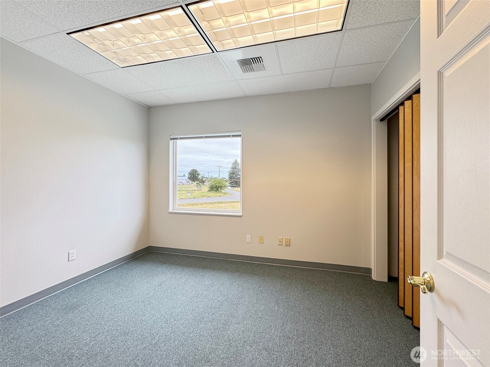 502 South Still Road Sequim, WA 98382 - Photo 20 of 40 a view of an empty room with a window