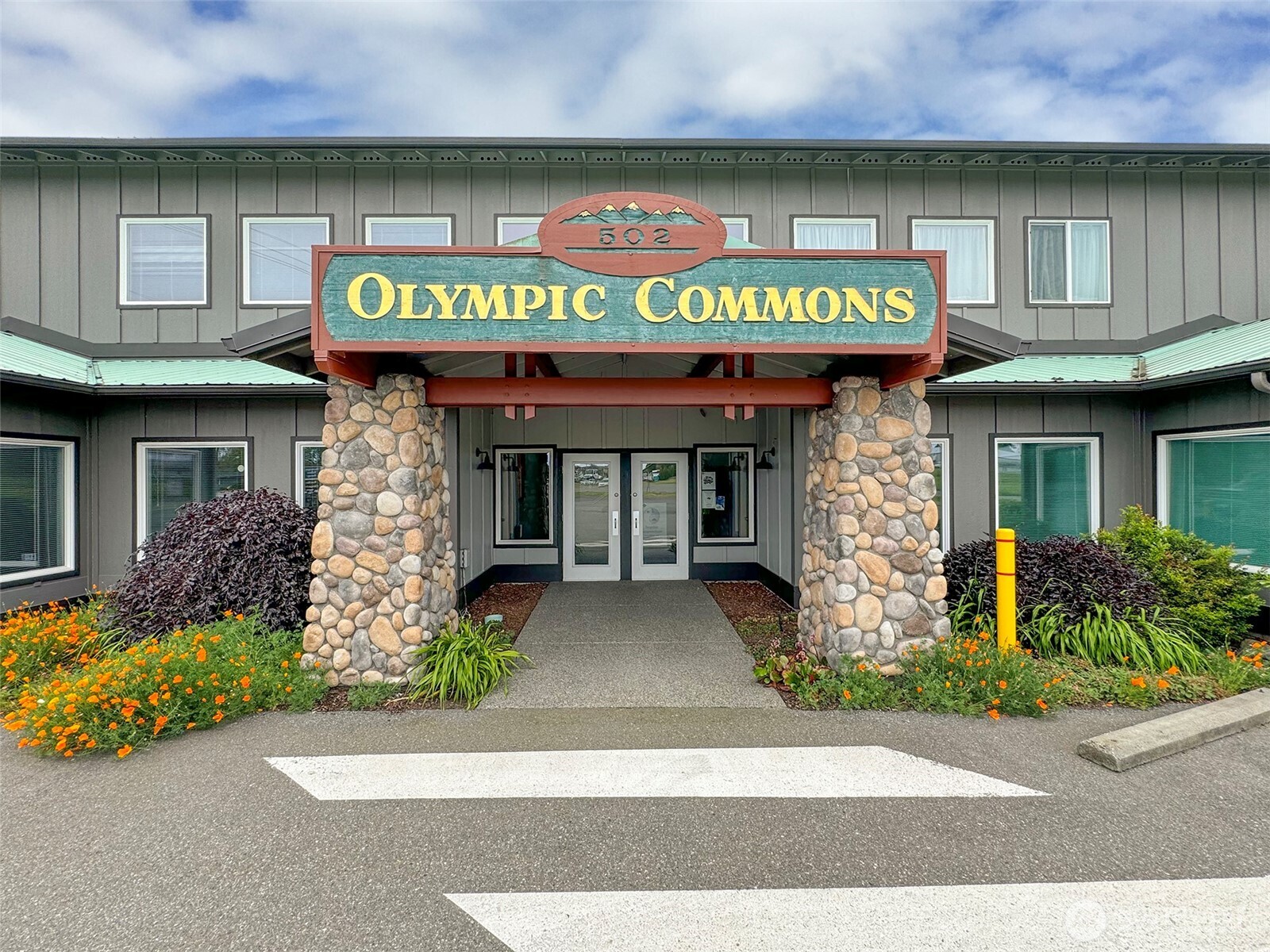 502 South Still Road Sequim, WA 98382 - Photo 2 of 40 a front view of a building with retail shops