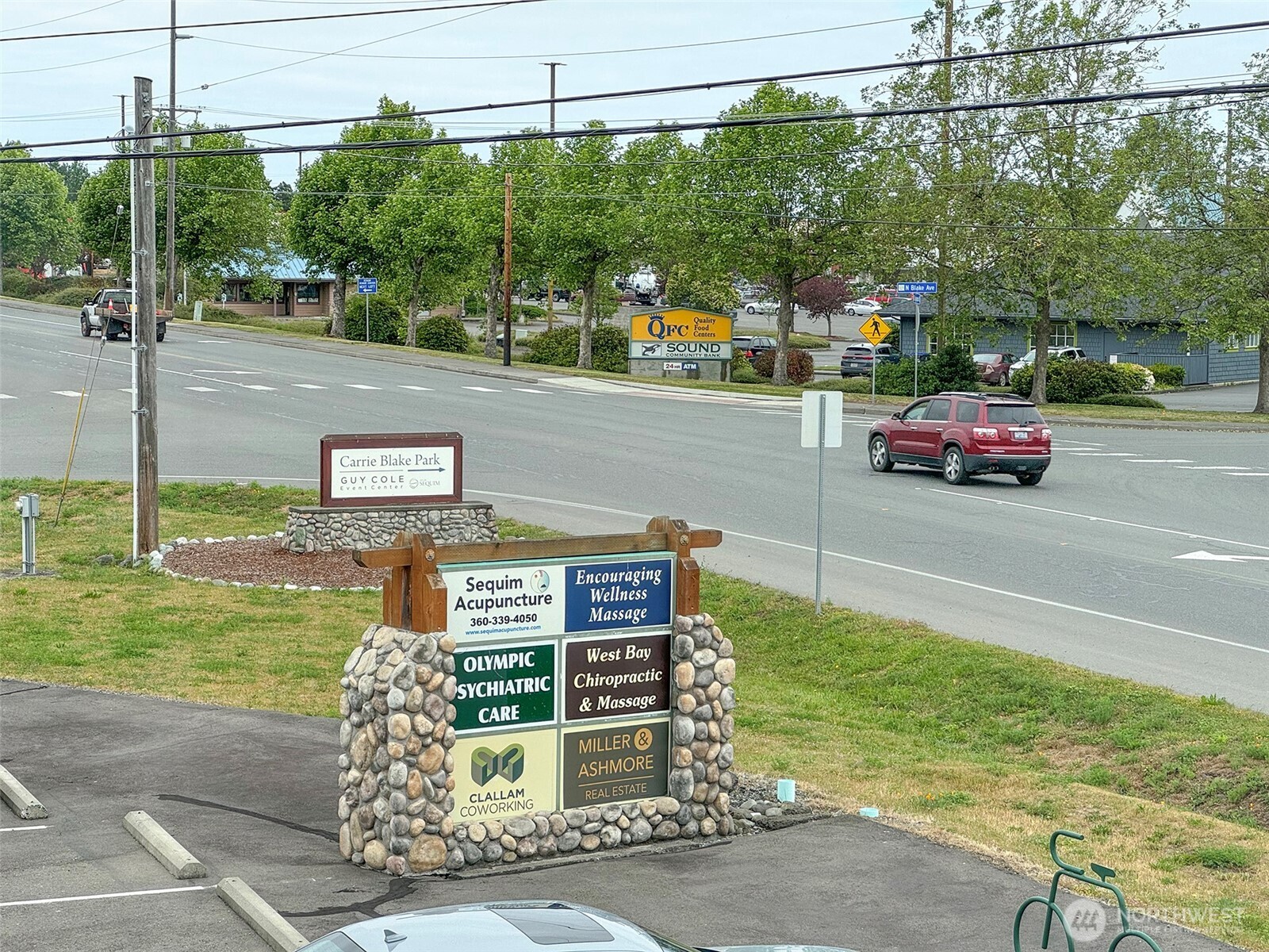 502 South Still Road Sequim, WA 98382 - Photo 22 of 40 a view of a street with cars parked on road