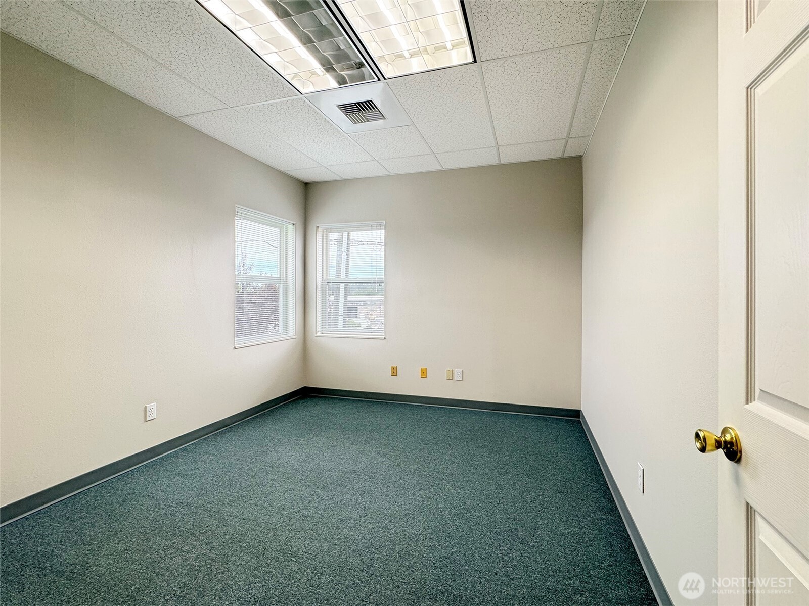 502 South Still Road Sequim, WA 98382 - Photo 26 of 40 an empty room with windows