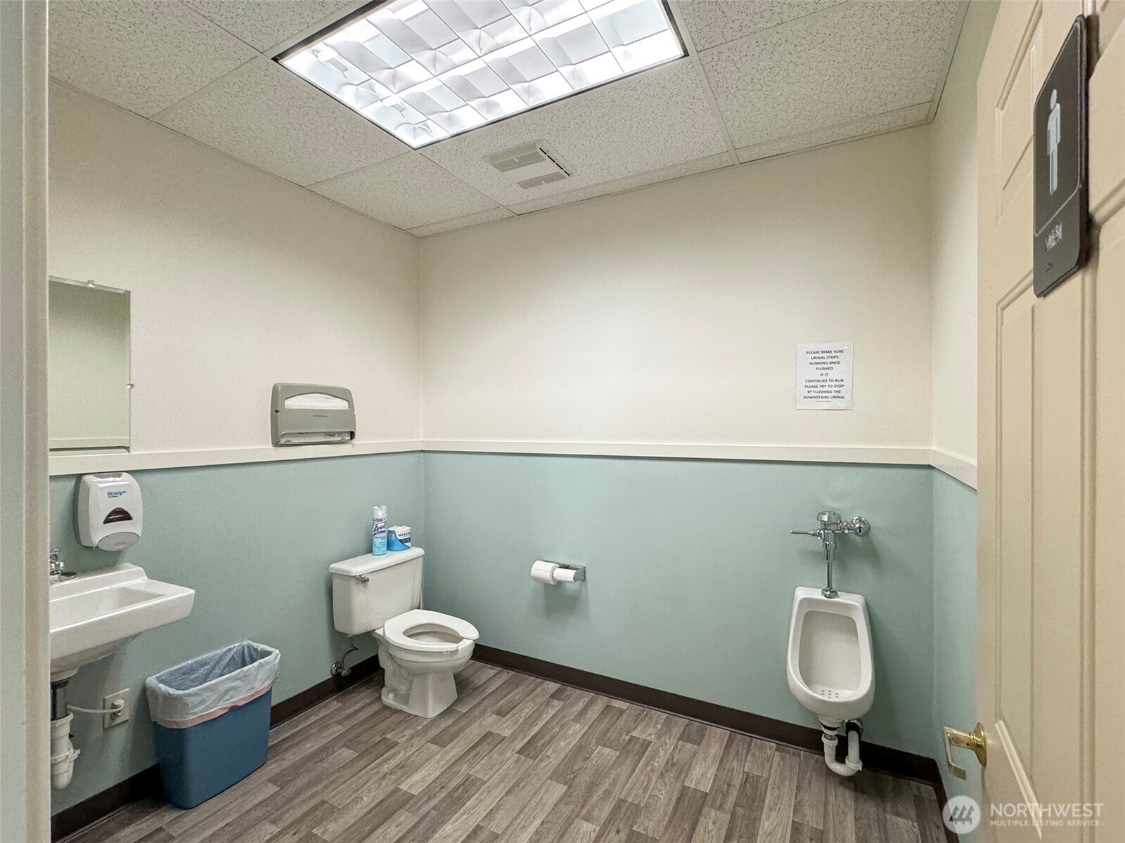 502 South Still Road Sequim, WA 98382 - Photo 39 of 40 a bathroom with a toilet and a mirror