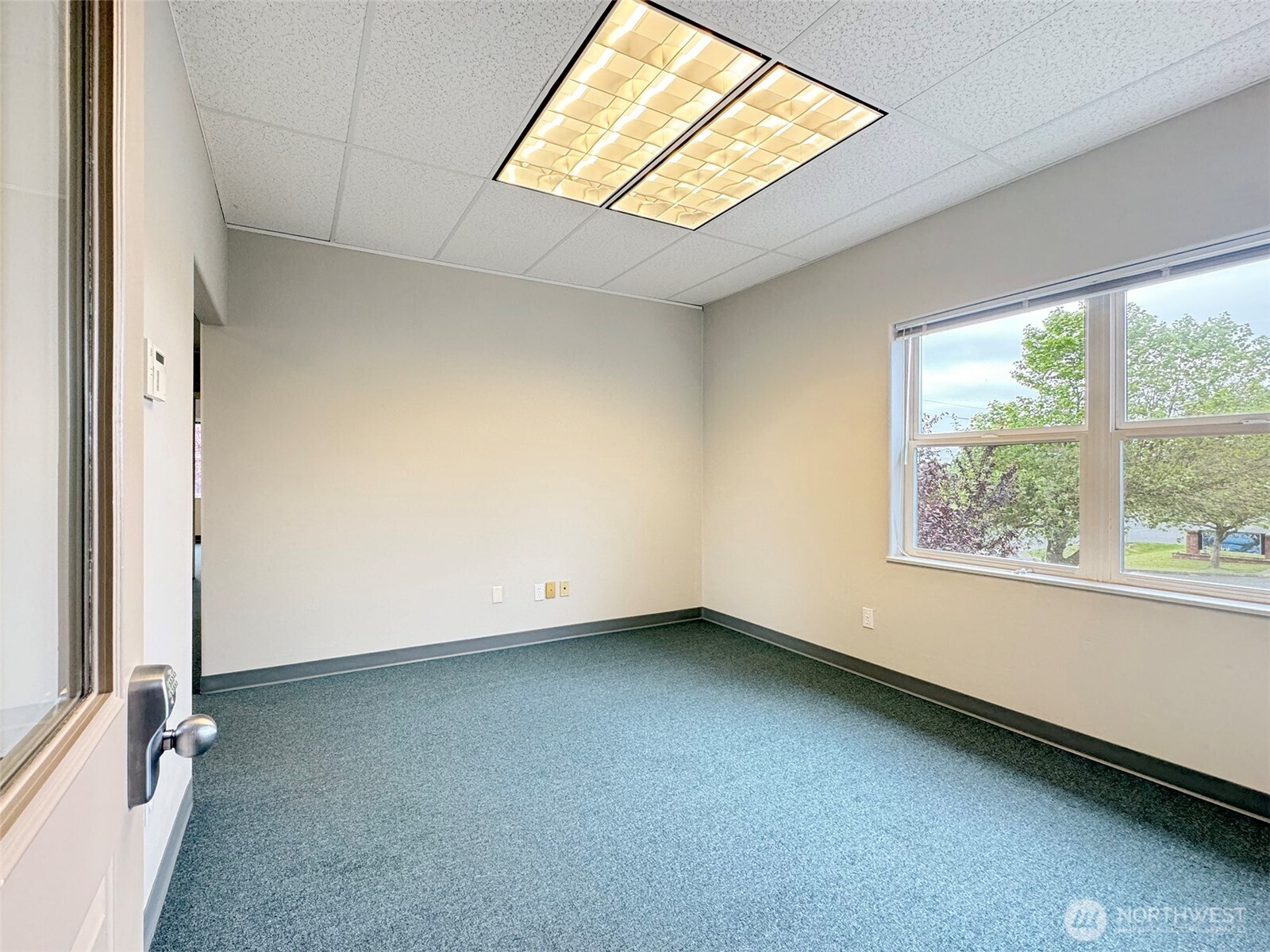 502 South Still Road Sequim, WA 98382 - Photo 5 of 40 an empty room with a window