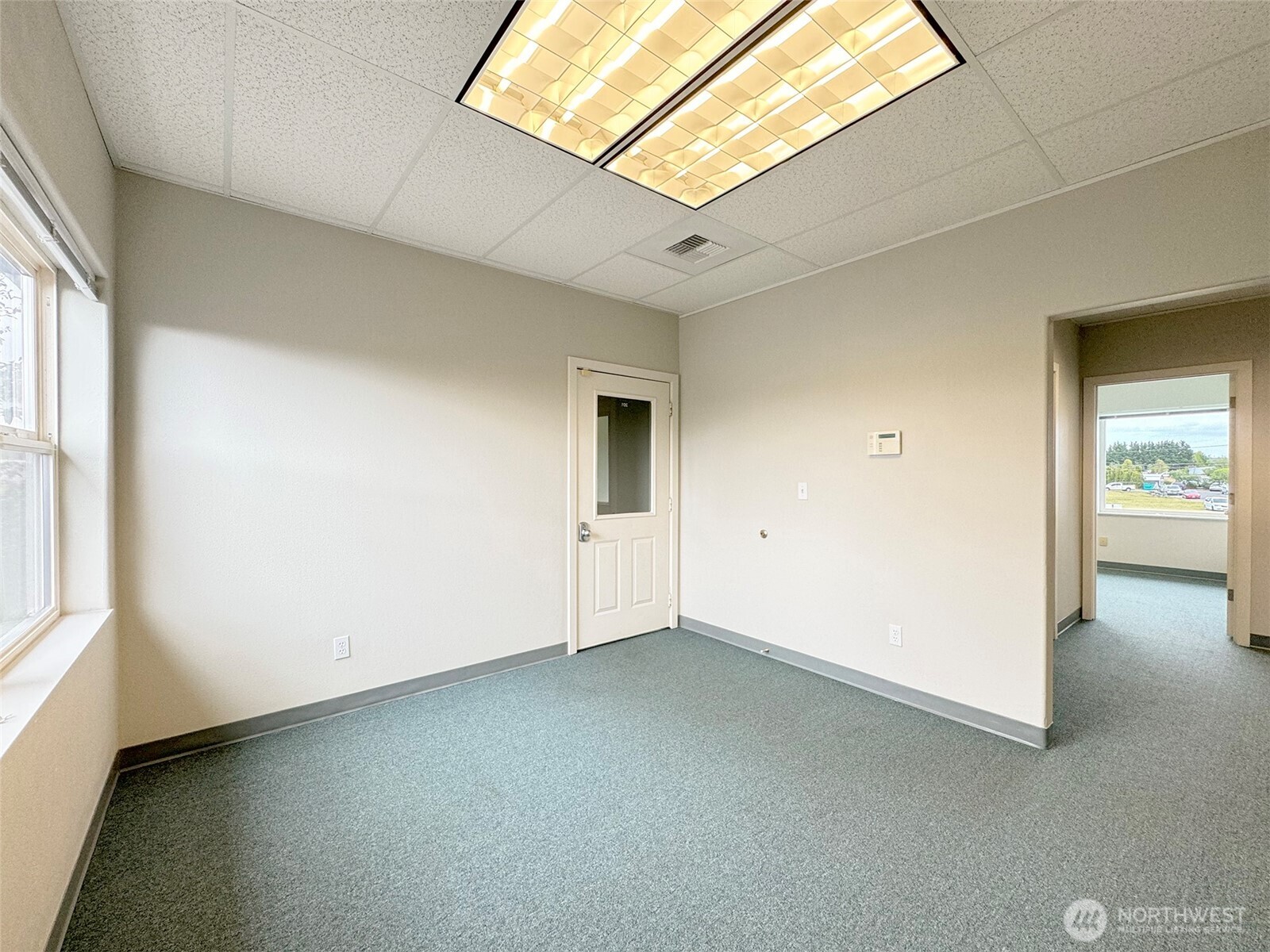502 South Still Road Sequim, WA 98382 - Photo 7 of 40 an empty room with windows