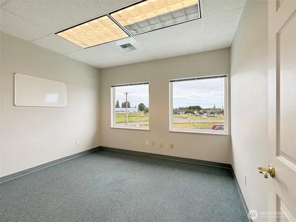 an empty room with windows